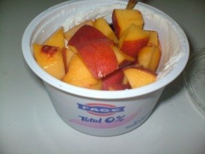 Fage yogurt and a peach